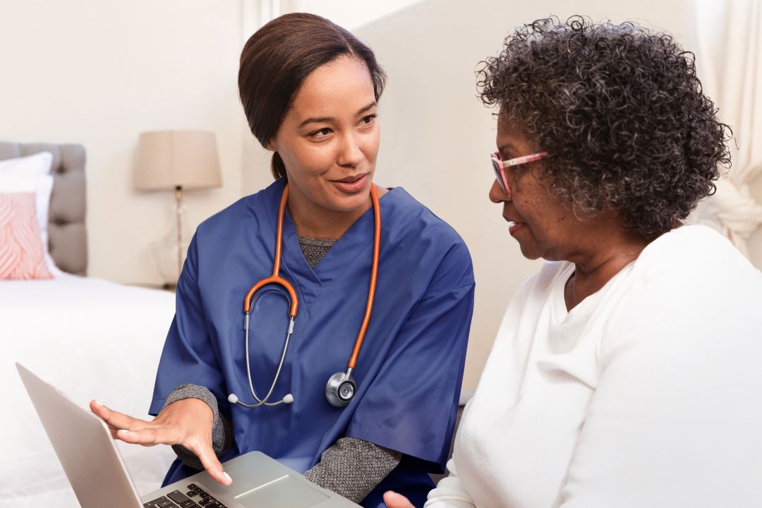 A provider explaining treatment to a paient